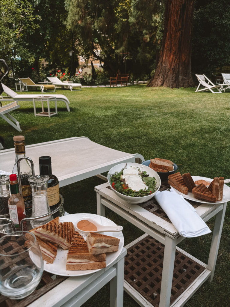 lunch by the pool at Parkhotel Laurin