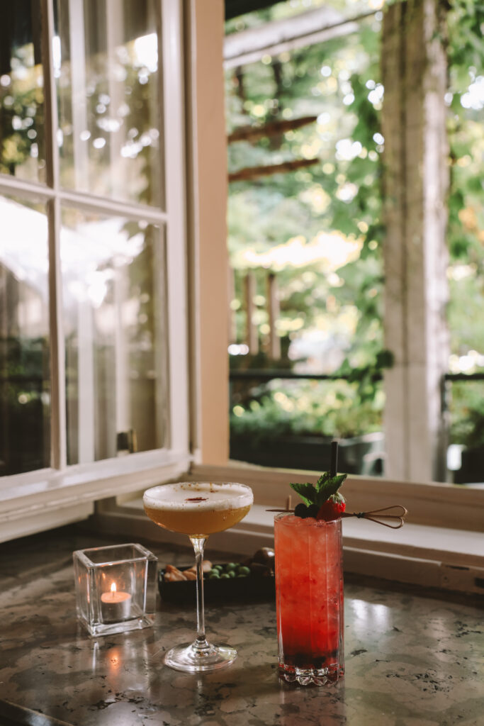 cocktails and a candle at the bar