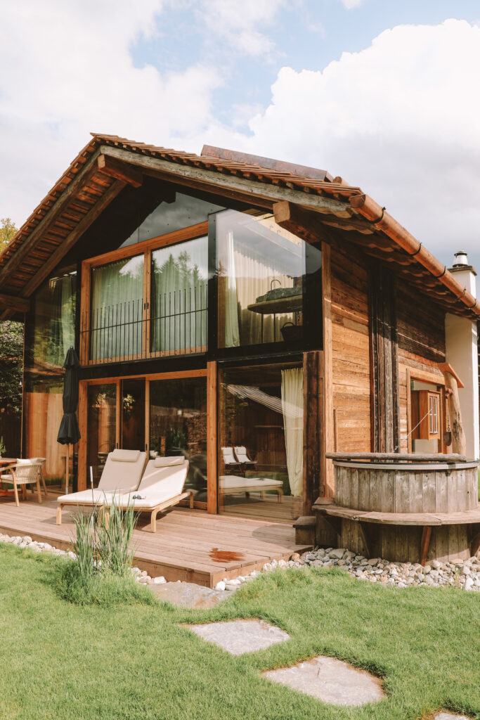 Luxury Lakeside Chalet Priesteregg exterior with private lake and mountain views