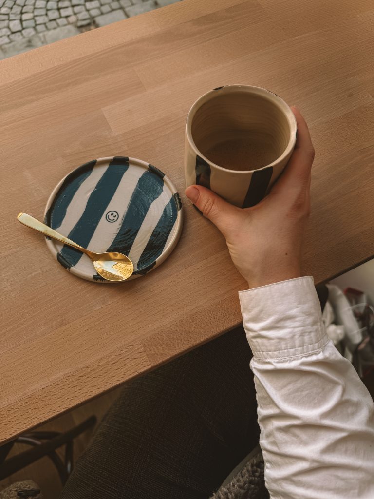 Quiet café interior in Graz during the day